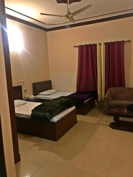 Babar House Hotel Faisalabad Exterior photo